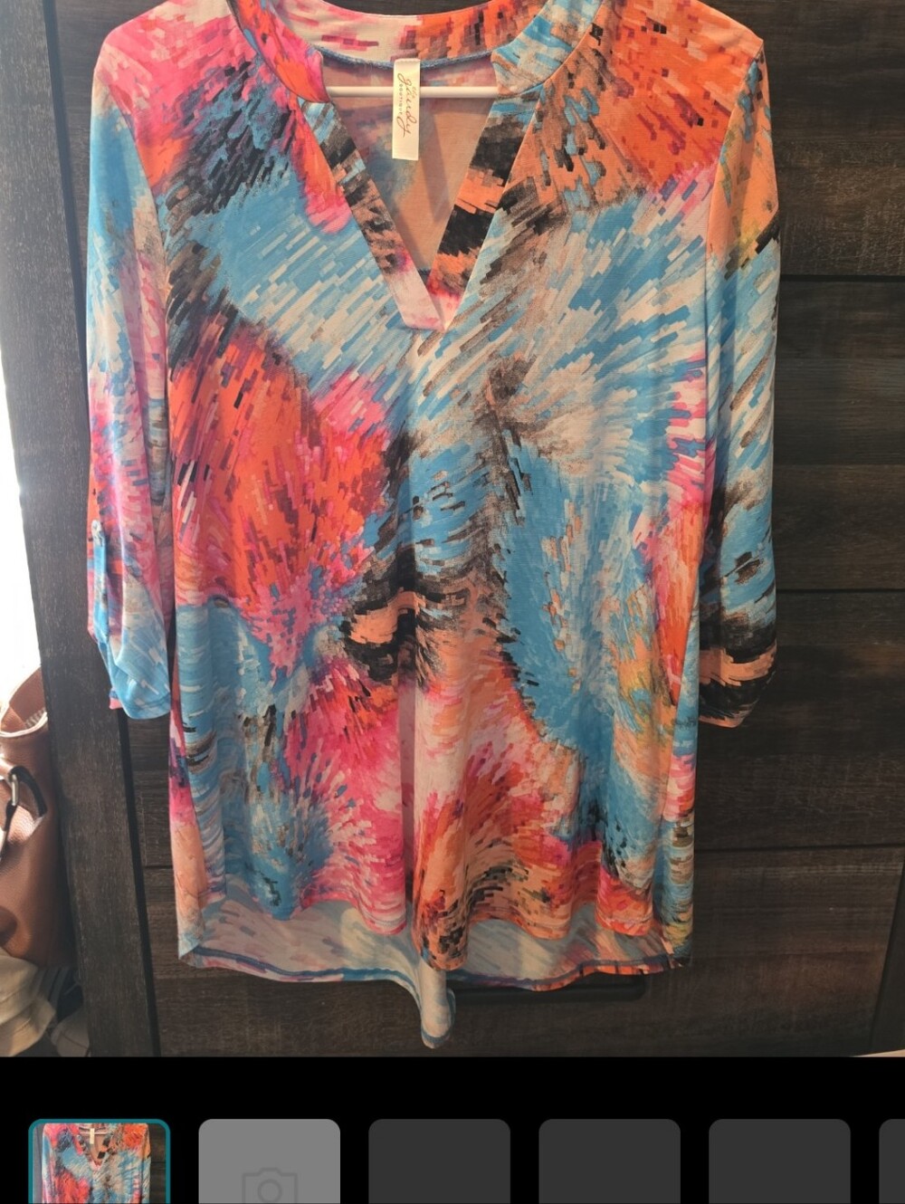 The Gaudy Boutique "Gabby" tunic top in size Small.